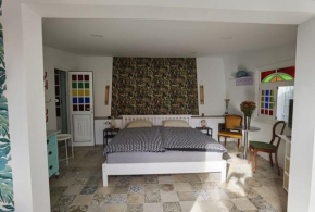 Appartement unter Palmen